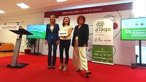 Guadalupe Vazuez recollendo o premio