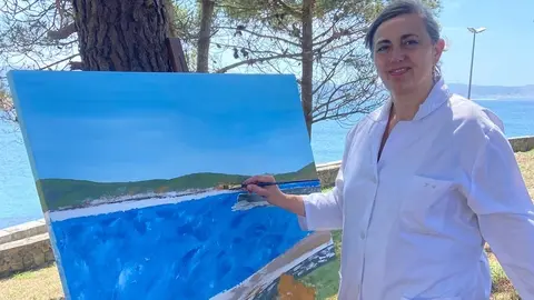 Isabel Soutullo pintanto ao oleo