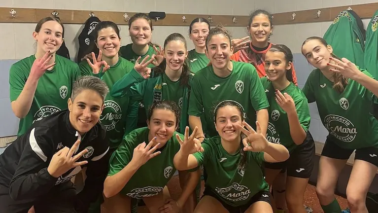 Xallas feminino celebrando a vitoria no vestiario