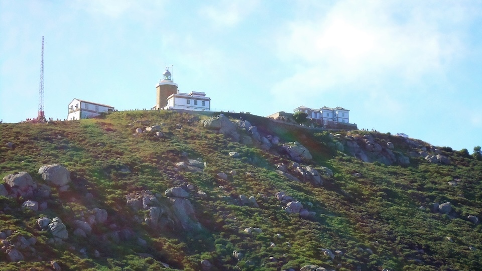 O Faro Fisterra e a sua vaca